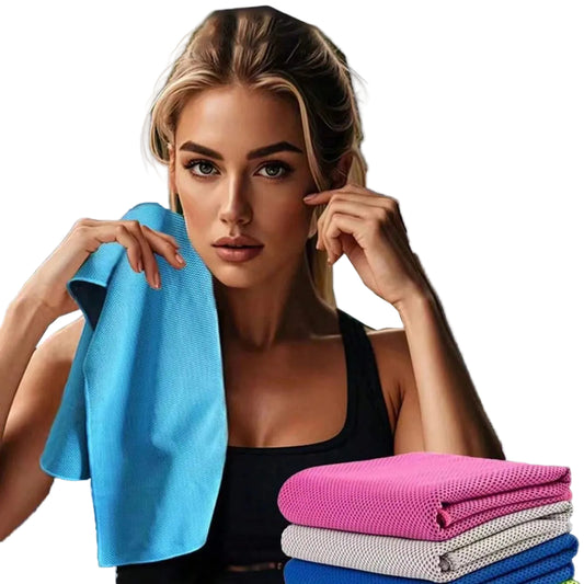 Woman holding a blue towel with stacked colorful towels in the background